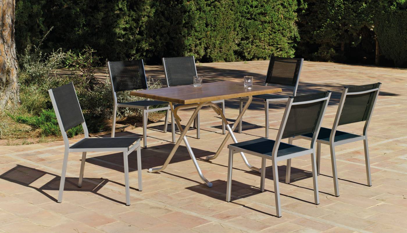 Conjunto aluminio: mesa rectangular plegable de 120 cm. con tablero de heverzaplus y 6 sillas de aluminio y textilen